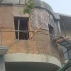 Casting the curved section of the hempcrete wall.