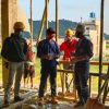 Participants discussing during the hempcrete building workshop